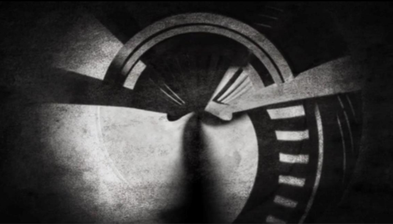 a black and white image of a spiral staircase